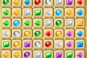 다양한 색상의 보석들이 격자무늬로 배열되어 있는 이미지