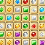 다양한 색상의 보석들이 격자무늬로 배열되어 있는 이미지