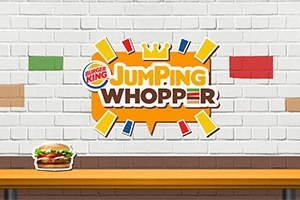 벽돌 배경에 JUMPING WHOPPER 로고가 있고, 아래 테이블 위에 와퍼 버거가 놓여 있습니다