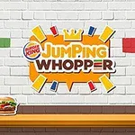 벽돌 배경에 JUMPING WHOPPER 로고가 있고, 아래 테이블 위에 와퍼 버거가 놓여 있습니다
