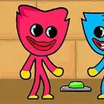 붉은 캐릭터와 파란 캐릭터가 초록색 버튼 앞에 서 있는 모습