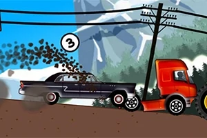 검은 승용차가 빨간 트럭을 언덕에서 밀고 있는 장면