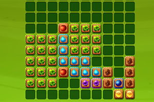 녹색 바탕 위에 다양한 색상의 블록들이 격자 모양으로 배열되어 있는 이미지