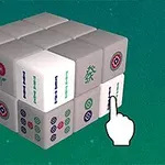 3x3 큐브 형태로 배열된 마작 패를 가리키고 있는 손 모양