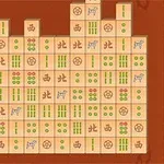 갈색 배경에 다양한 무늬와 문양이 있는 마작 타일들이 배열되어 있다