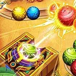 다양한 색상의 구슬들이 길에 따라 배열되어 있으며, 일부 구슬은 빛나고 터지고 있다