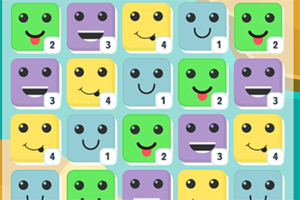 다양한 색상의 귀여운 얼굴이 그려진 네모난 블록들이 숫자와 함께 배열되어 있습니다