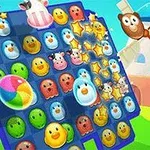 파란색 배경에 다양한 동물 얼굴 모양의 알록달록한 아이콘들로 구성된 퍼즐 보드