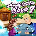 소녀와 남성이 돌고래와 함께 물속에서 상호작용하며 웃고 있는 장면