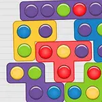 다양한 색상의 원형 버튼이 포함된 테트리스 모양 블록들이 서로 맞물려 있는 모습