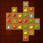 배경이 어두운 격자무늬 위에 모양과 색상이 다른 타일들이 십자 형태로 배열되어 있는 모습