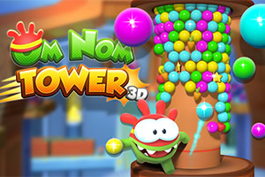 녹색 캐릭터가 다채로운 공들로 채워진 탑 옆에 있는 모습