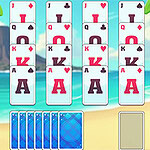 해변 배경에서 알로하 드레스를 입은 여성 옆에 카드를 배열한 모습