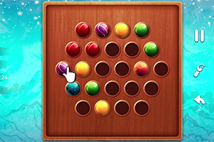 나무 보드 위에 다양한 색상의 구슬이 배열되어 있고, 손 모양의 커서가 보라색 구슬을 가리키고 있는 이미지