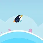 하늘을 배경으로 작은 펭귄이 둥근 얼음판 위를 날고 있는 모습