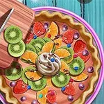 키위, 귤, 딸기, 생크림 등 다양한 과일과 장식이 올라간 화려한 파이