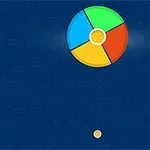 파란색 배경에 녹색, 파란색, 빨간색, 노란색으로 구분된 큰 원과 작은 노란색 원이 있습니다