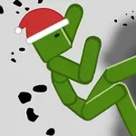 산타 모자를 쓴 녹색 막대 인형이 검은 조각들 사이에 떠 있는 모습