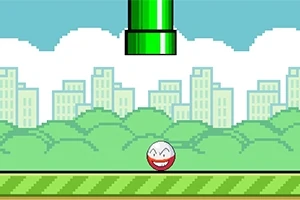 초록색 파이프가 하늘에서 내려오고, 웃는 표정을 지닌 공이 녹색 잔디 위에 있는 장면