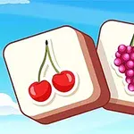 두 개의 과일 이미지를 가진 흰색 블록이 파란 하늘 배경에 나란히 놓여 있으며, 하나는 체리, 다른 하나는 포도를 보여줍니다