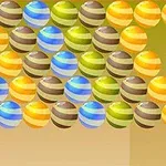 Professor Bubble라는 알록달록한 텍스트와 여러 색깔의 줄무늬 공들이 있는 장면