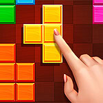 색색의 블록들로 채워진 격자 무늬 배경 위에 중앙에 노란색 블록을 손가락이 가리키고 있는 장면