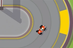 붉은색 카트가 회색 트랙의 곡선 구간을 주행하는 상공 이미지