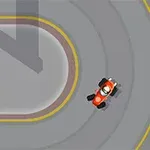 붉은색 카트가 회색 트랙의 곡선 구간을 주행하는 상공 이미지