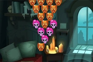 주황색과 분홍색 해골 모양이 방 안에 걸려 있으며, 창문 옆에 촛불이 켜져 있는 어두운 실내