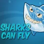 파란 배경에 날카로운 이빨을 드러낸 웃는 표정의 만화 상어와 SHARKS CAN FLY라는 문구가 있습니다