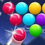 밤하늘을 배경으로 다양한 색상의 구슬들이 쌓여 있으며, 아래에서는 빨간색 구슬이 발사 준비 중인 모습