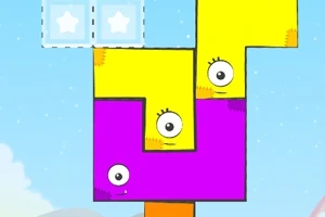 노란색과 자주색 블록들이 쌓여 있으며, 각 블록에는 눈이 그려져 있습니다