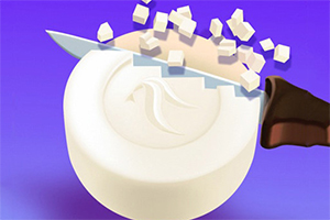 흰색 원형 물체가 나이프로 잘리며 작은 큐브 형태로 떨어지고 있는 이미지