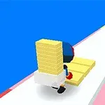 캐릭터가 노란 블록을 들고 흰색과 핑크색 경로 위를 걷고 있는 모습