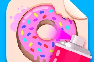 분홍색 아이싱과 알록달록한 스프링클이 뿌려진 도넛과 스프레이 페인트 캔