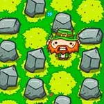 초록 잔디밭 위에 돌들이 놓여 있고, 빨간 수염을 가진 작은 캐릭터가 서 있다