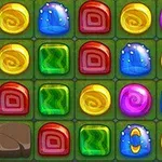 다양한 색상의 보석과 사탕 모양의 아이콘들이 격자 형태로 배열되어 있는 이미지