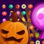 할로윈 테마의 호박과 해골 캔디가 다양한 모양과 색상의 사탕들과 함께 배치된 이미지