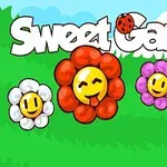 푸른 하늘을 배경으로 다양한 표정을 가진 알록달록한 웃는 얼굴 꽃과 Sweet Garden 텍스트가 있는 이미지