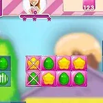 색색의 별과 사탕 모양 타일로 구성된 퍼즐 보드 화면