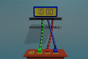 벽에 설치된 디지털 시계 아래 여러 가지 색상의 케이블이 엉켜 있는 모습