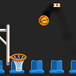 농구공이 농구 골대에 들어가는 장면과 파란색 좌석들이 있는 이미지
