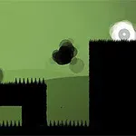 녹색 배경 위에 검정색 장애물과 흰 눈같은 캐릭터가 있는 장면