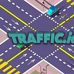 교차로에 자동차들이 움직이는 장면과 TRAFFIC