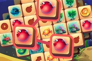 밝은 색상의 퍼즐 조각들이 있는 화면에 빨간 물고기 그림과 다양한 해양 생물 아이콘이 배열돼 있다