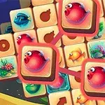 밝은 색상의 퍼즐 조각들이 있는 화면에 빨간 물고기 그림과 다양한 해양 생물 아이콘이 배열돼 있다