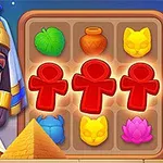 고대 이집트 스타일의 의상을 입은 여성과 다양한 색상의 상징이 그려진 보드 게임