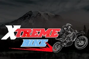 산을 배경으로 Xtreme Bike라는 텍스트와 오토바이를 타는 라이더의 실루엣이 있는 이미지