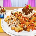 와플과 아이스크림이 접시에 디저트로 올려져 있으며, 주변에는 초콜릿과 과자 장식이 놓여 있다